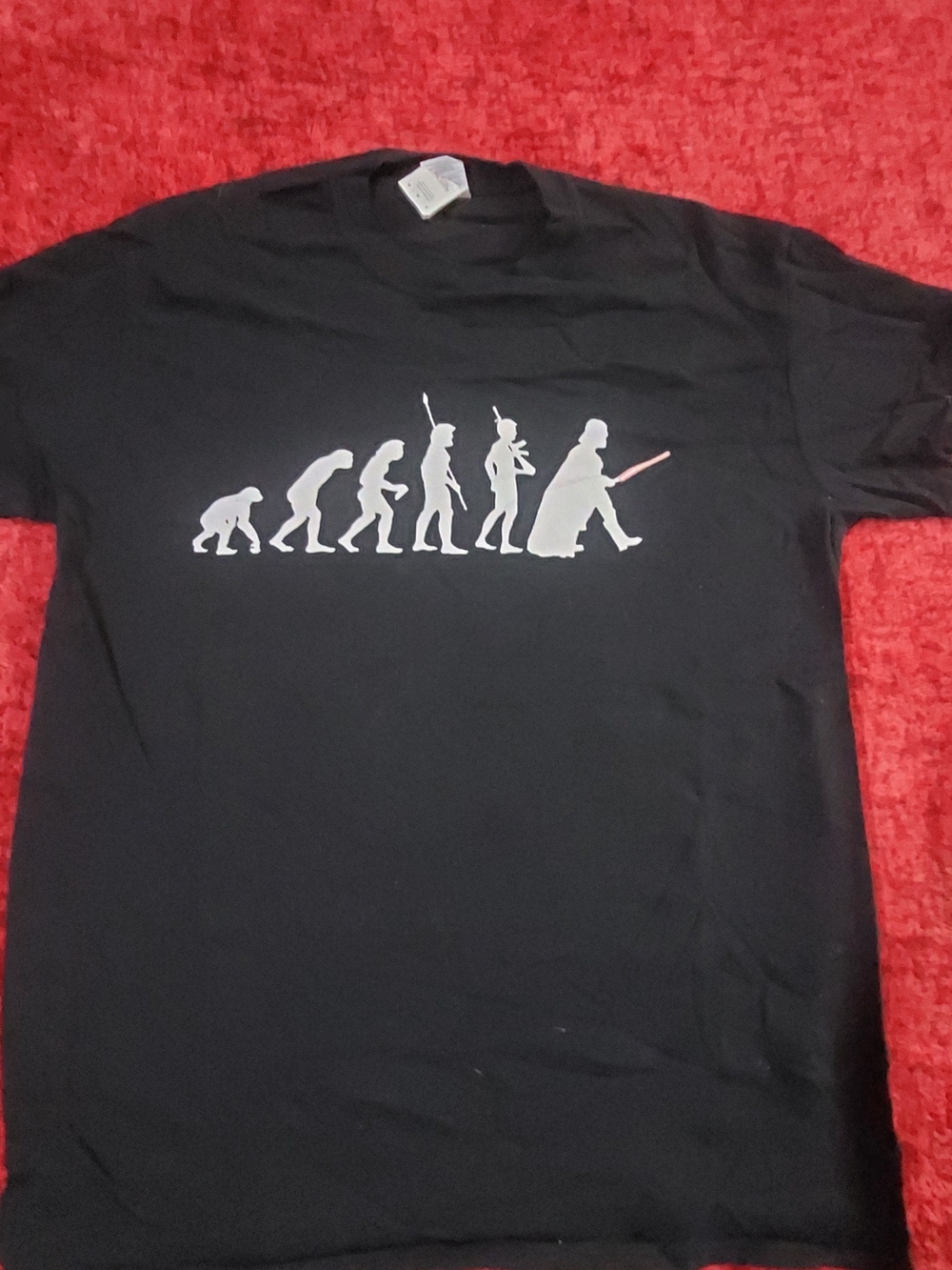 Star Wars Black T-Shirt with Silver Evolution Graphic and Red Lightsaber Accent